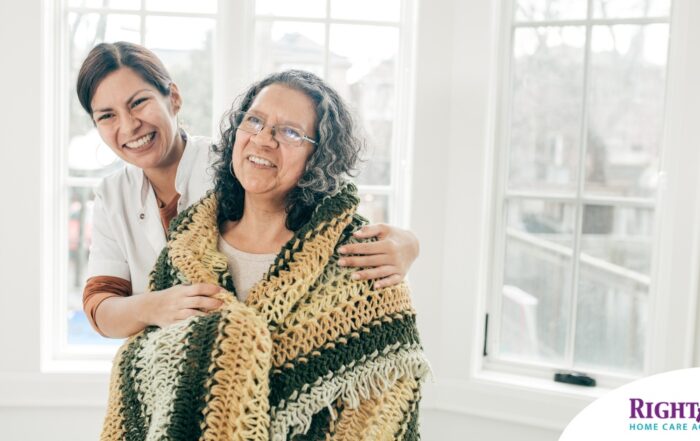 A caregiver hugs an older client representing the kind of good environment a caregiver has the potential to create with new clients.